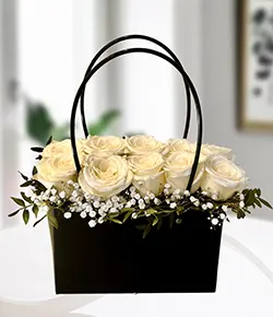 White rose flower ba...
